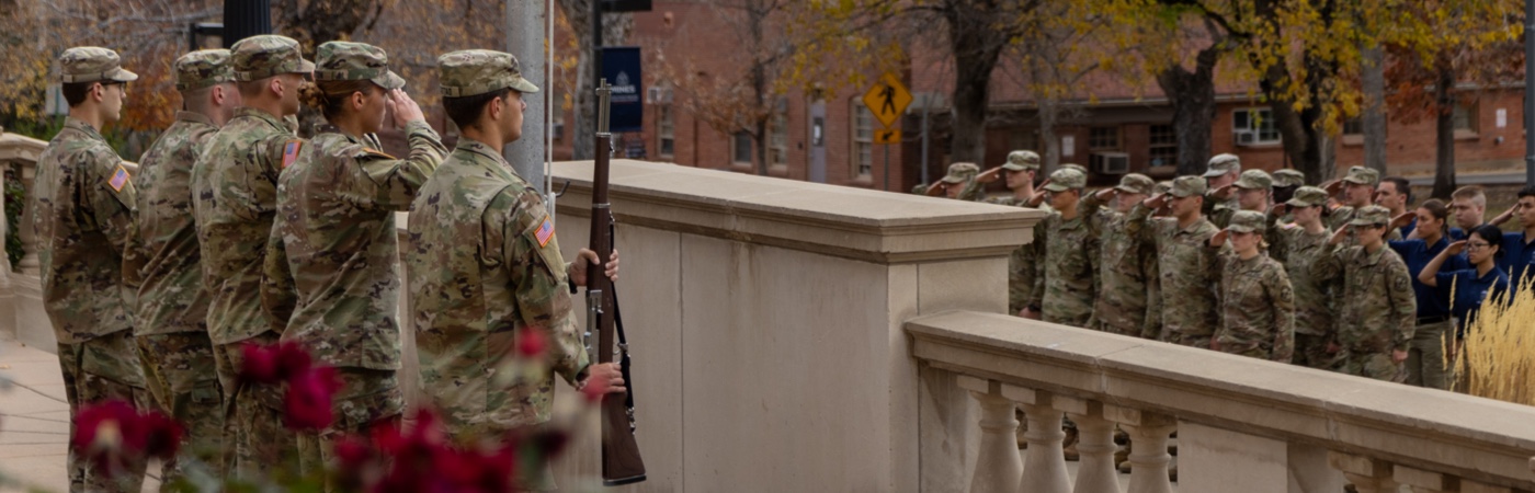 Army ROTC at Mines standing at attention for the Reveille ceremony.