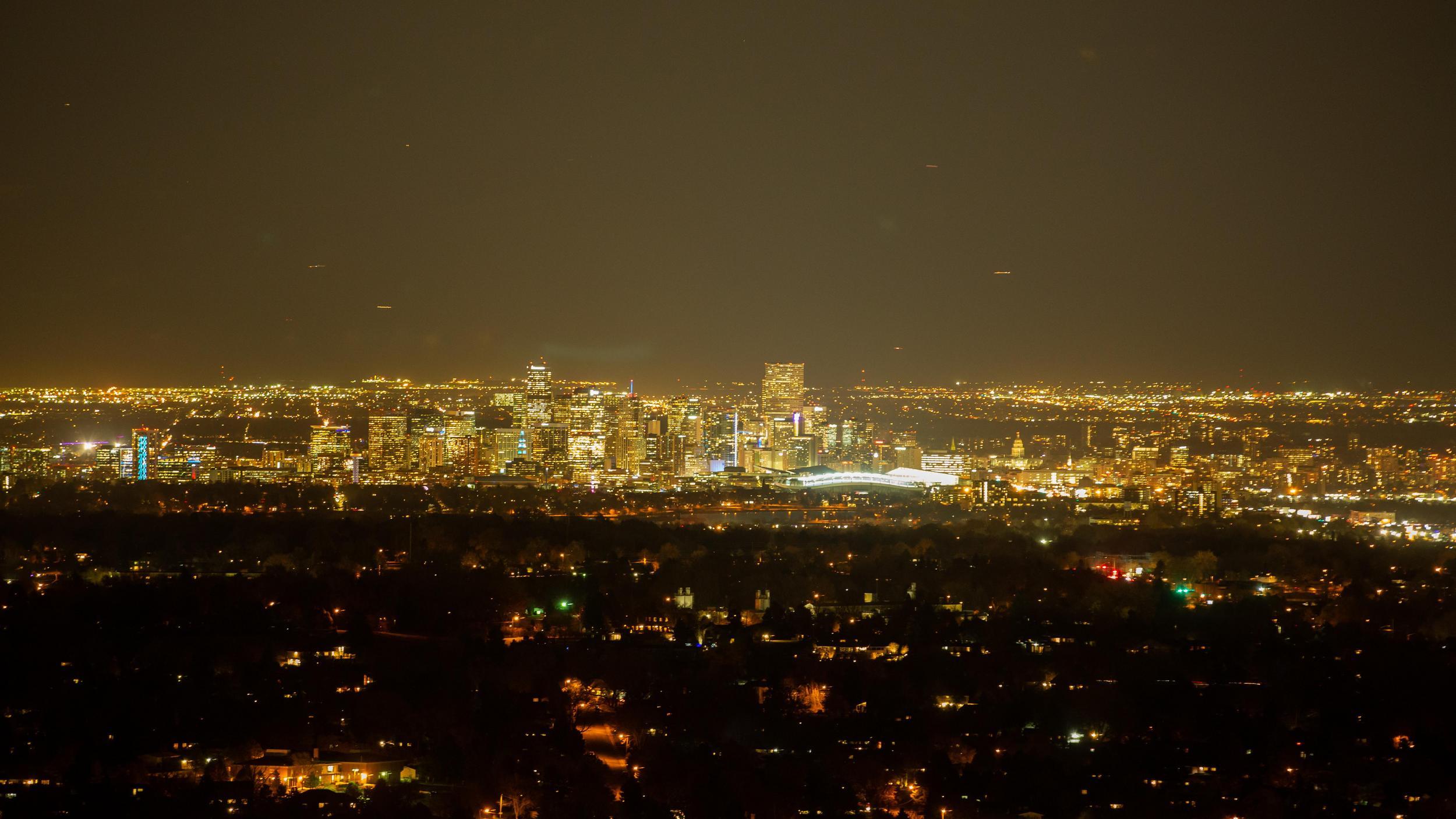Denver's electrical grid on display in this photo of the heart of the city lit up at night.